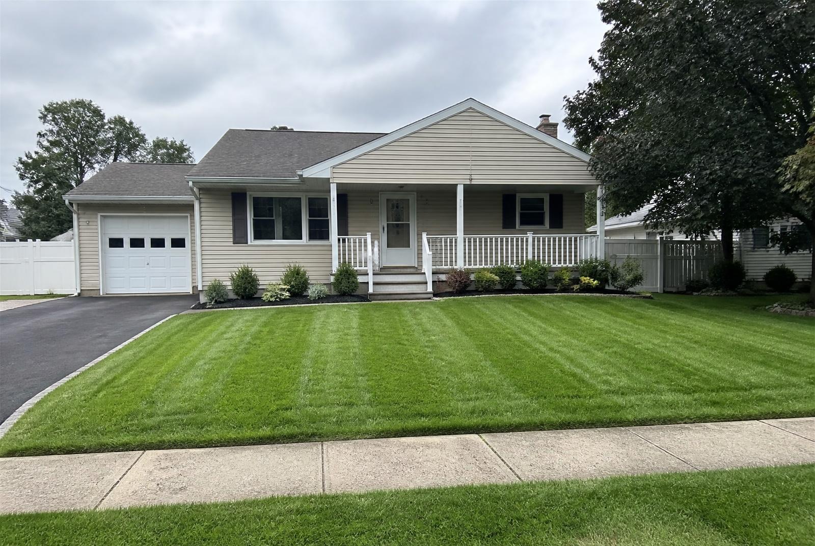 Freshly mowed lawn with crisp edging — after professional lawn care
